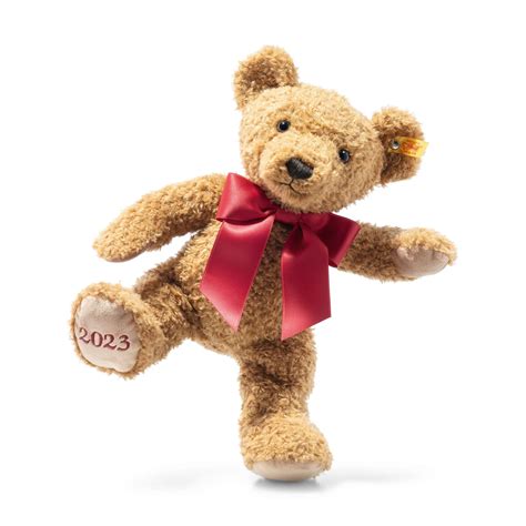 christmas teddy bear with year on foot